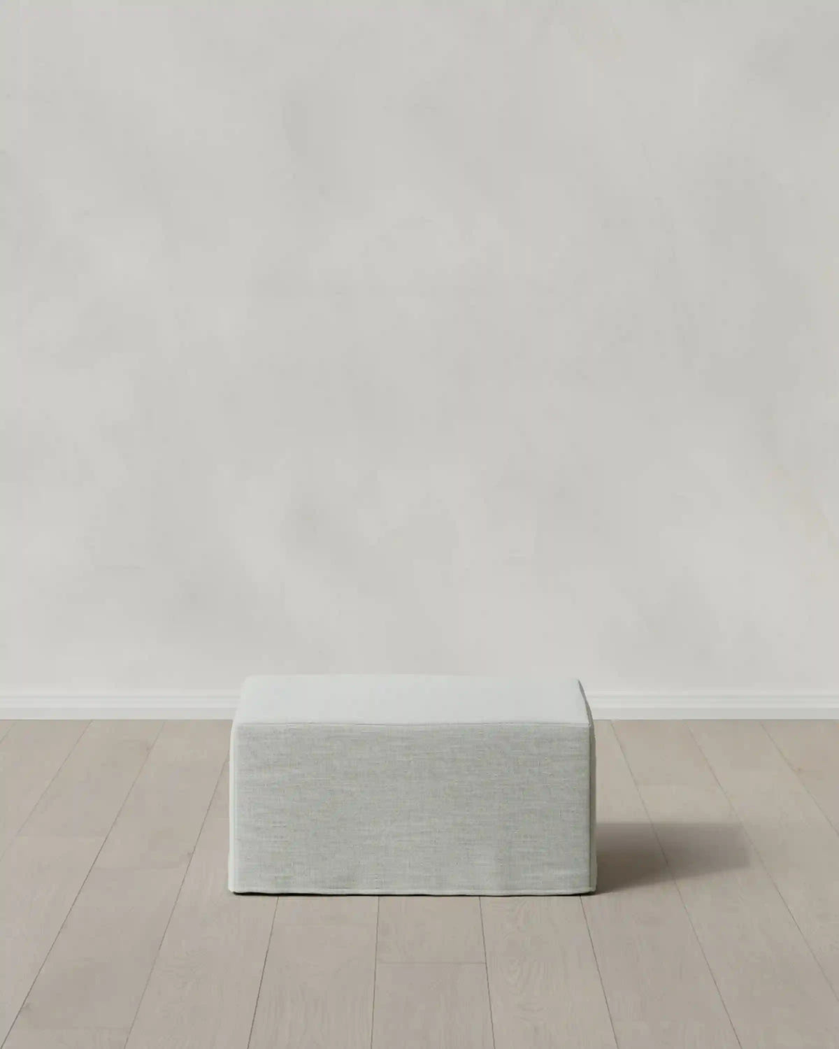 Ellery Slipcover Ottoman in Performance Linen