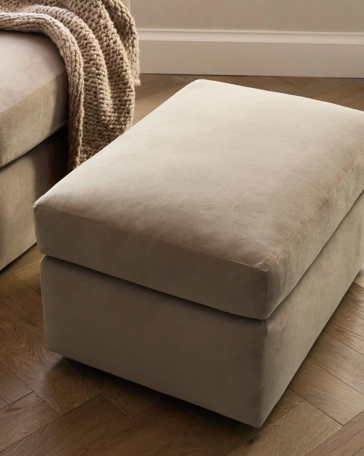 Brennan Ottoman in Performance Velvet