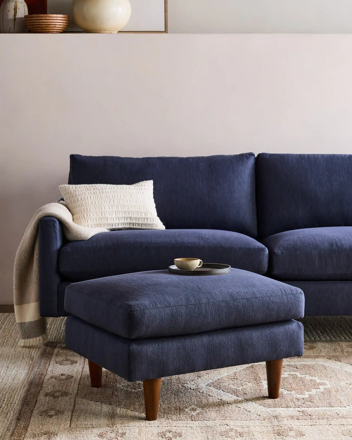 Atlas Midcentury Ottoman in Performance Velvet