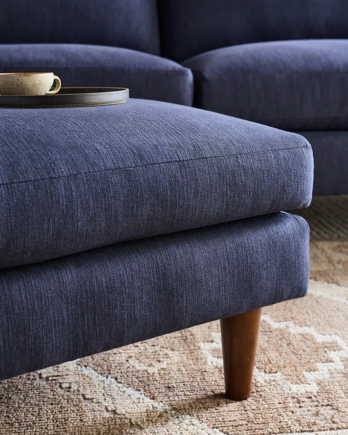 Atlas Midcentury Ottoman in Performance Velvet