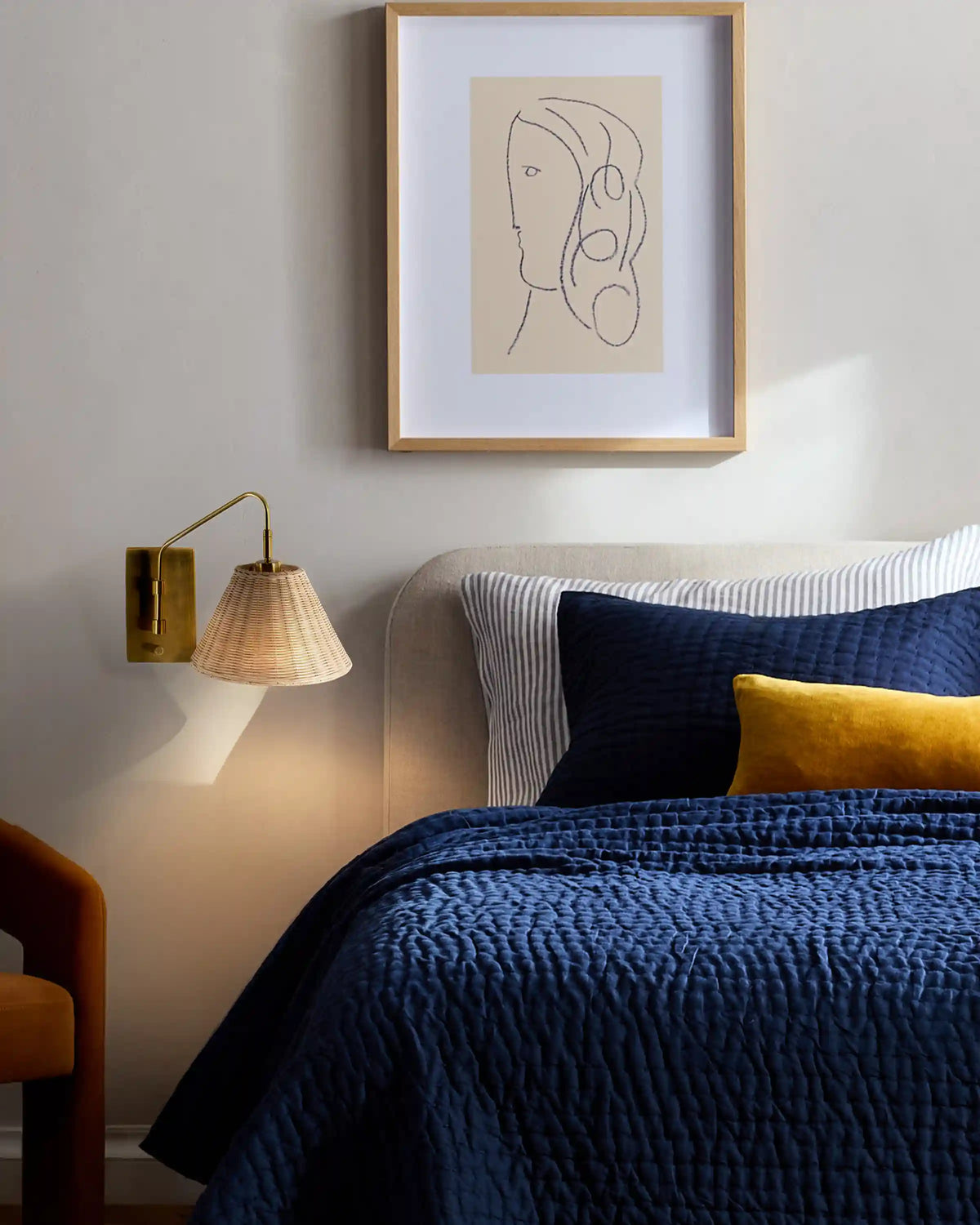 Articulating Sconce with Rattan Shade